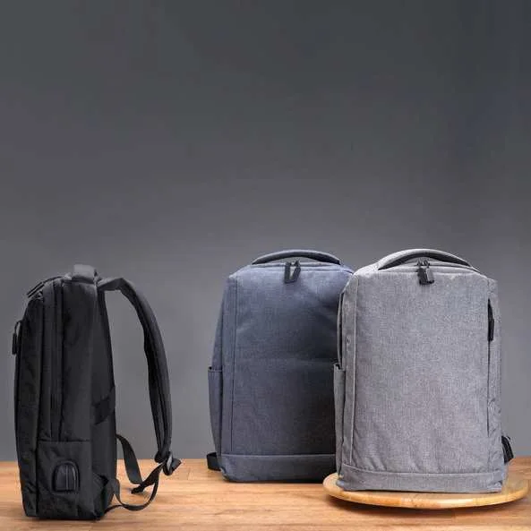 Velcora Recycled RPET USB Backpack, Black, blue and grey laptop backpacks on table