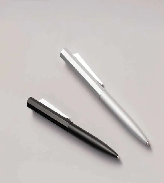 Giftology Aldevon Twist-Action Metal Pen, Black and silver geometric pens, lifestyle arrangement